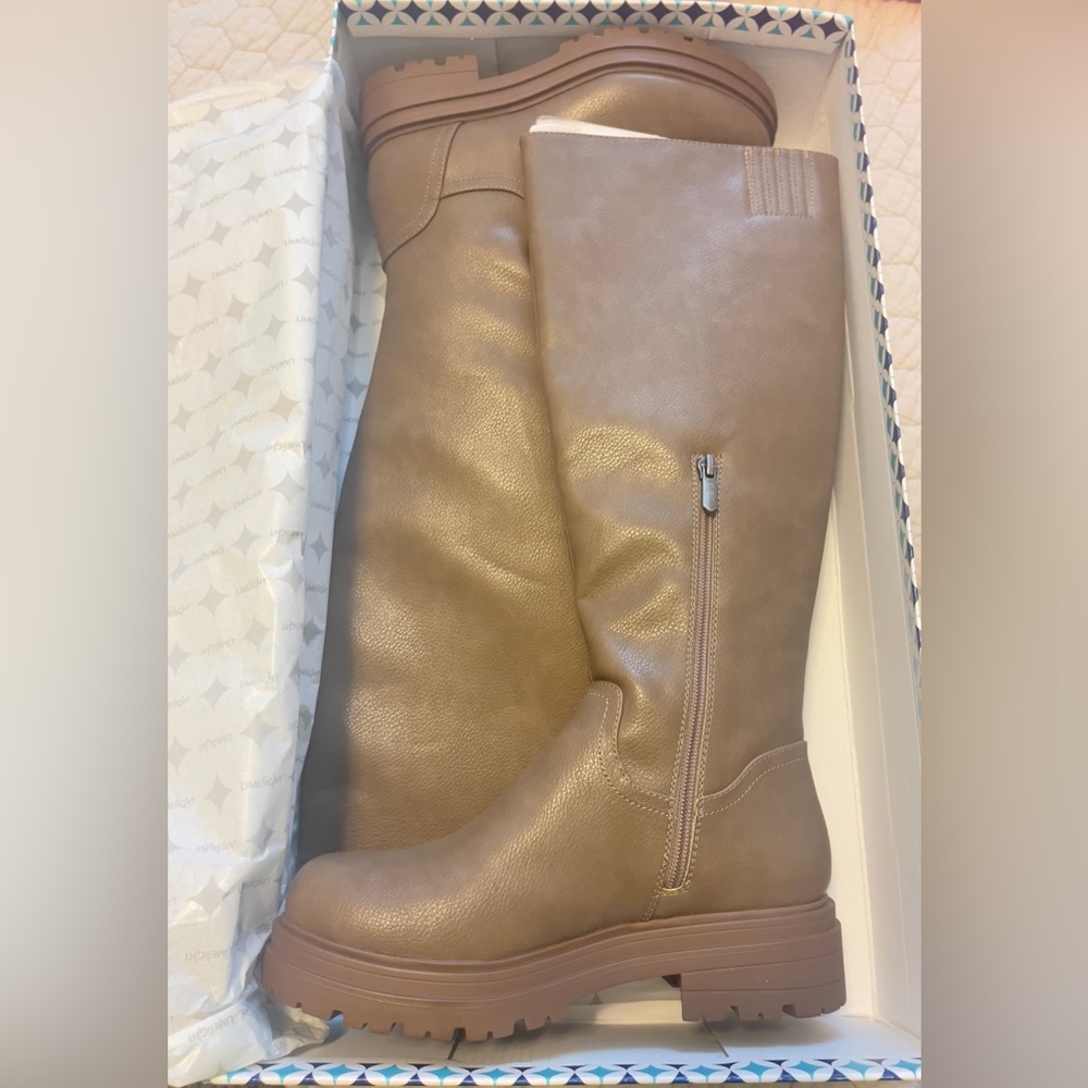 NIB boots, stone colored. Never worn at all.